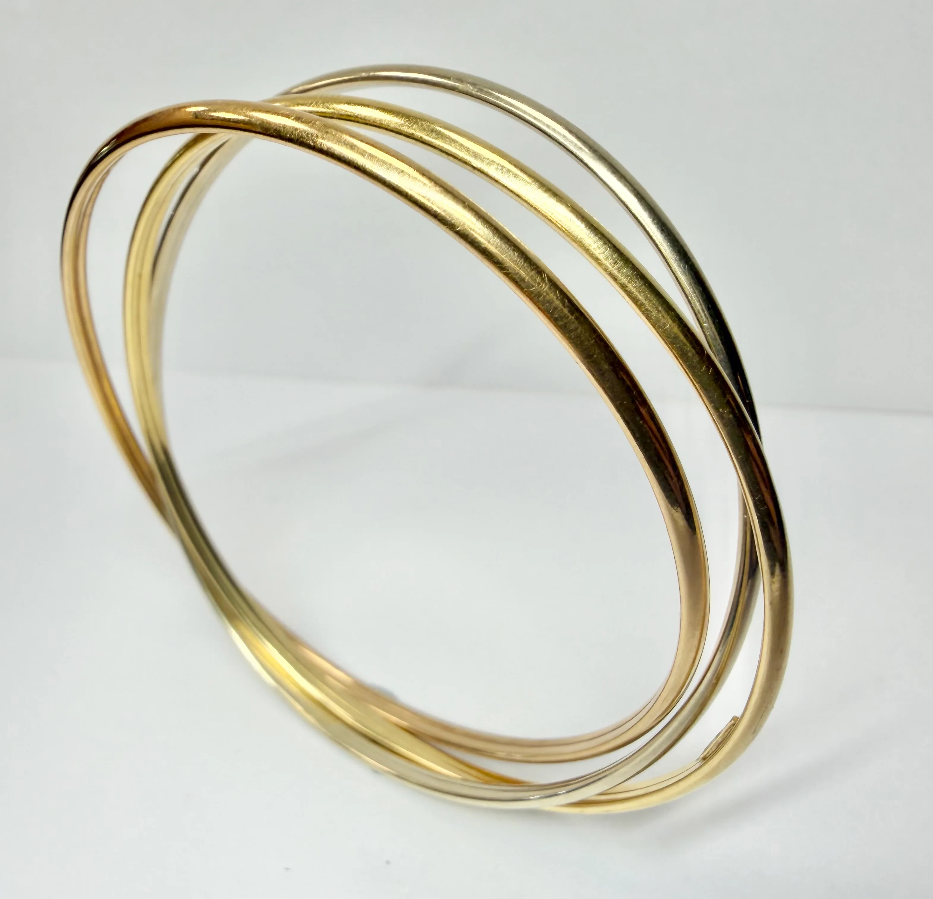 18ct yellow/white/rose gold interlinked trio bangles