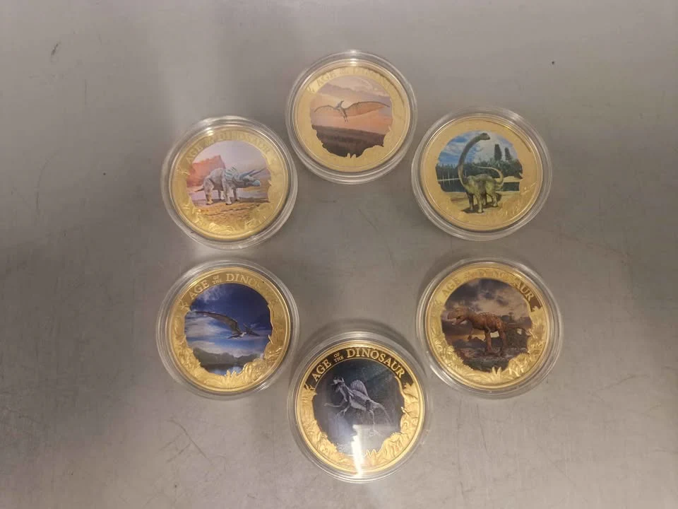 18x Age of the Dinosaurs coins. 24 carat gold plated copper, certificates of authenticity and protective sleeves included - Image 3