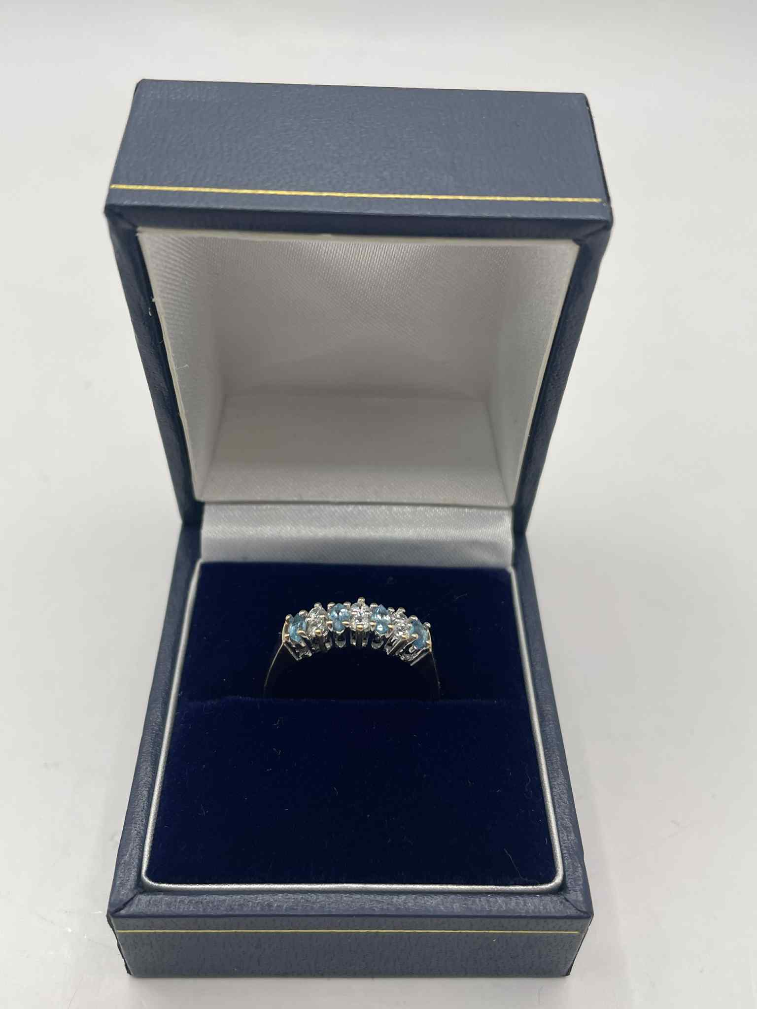 9ct Gold Ring With Clear and Blue Stones - O