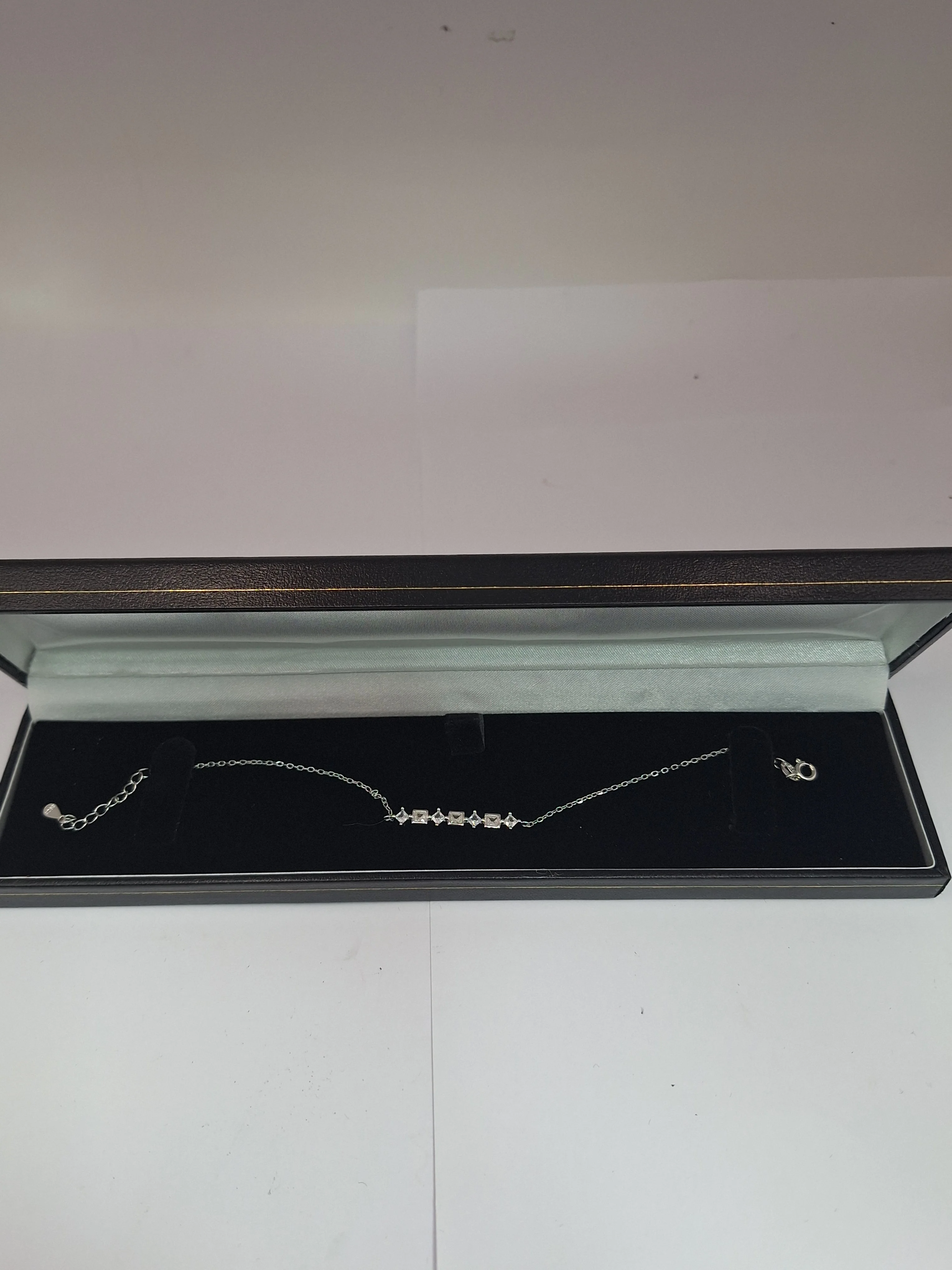 NEW OTHER SILVER BRACELET WITH STAR AND SQUARE ,CZ ,925, LENGHT 8" WEIGHT 1.9G . - Image 2