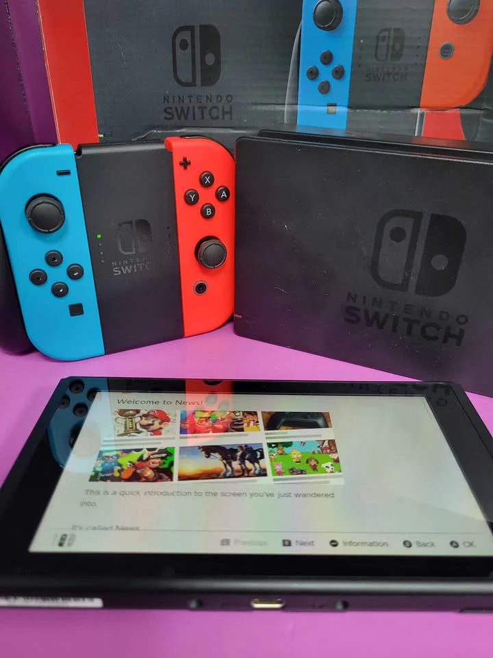 Nintendo Switch console 32GB + Neon Red/Blue Joy-Cons, Dock And Comfort Grip - Image 2