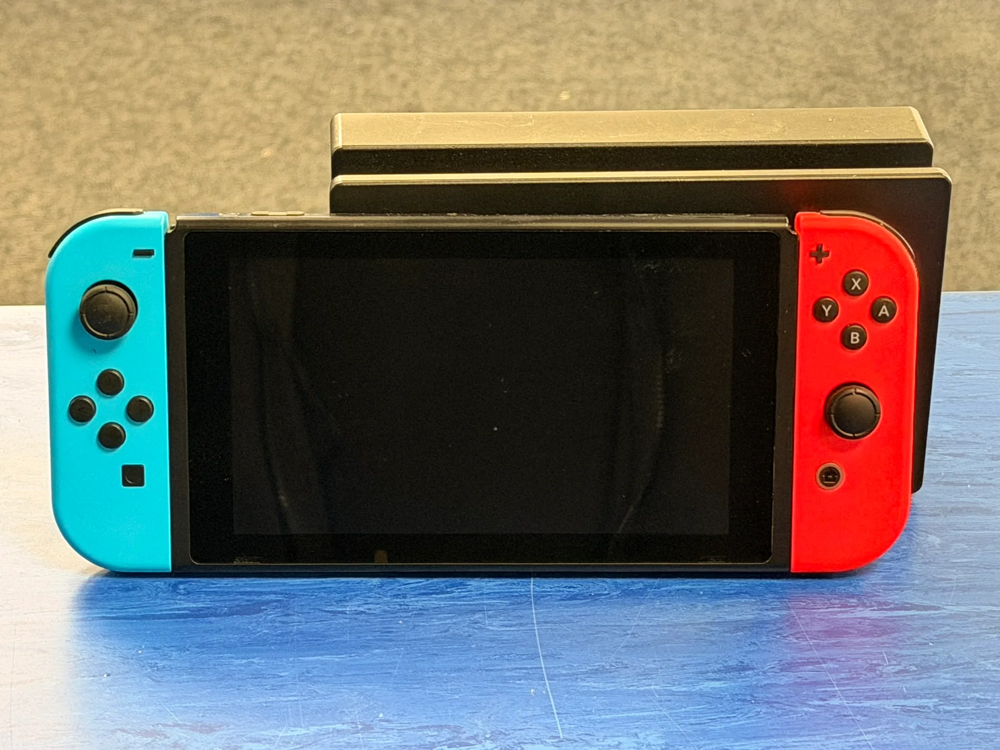 nintendo switch console red and blue joycons