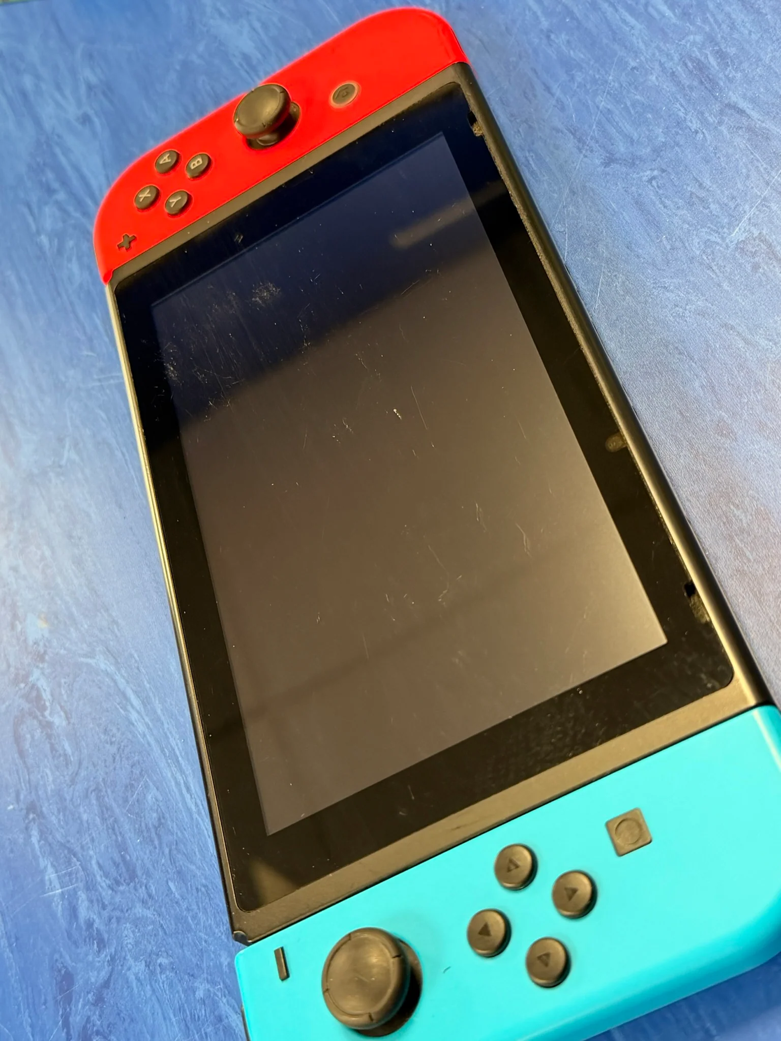 nintendo switch console red and blue joycons - Image 3