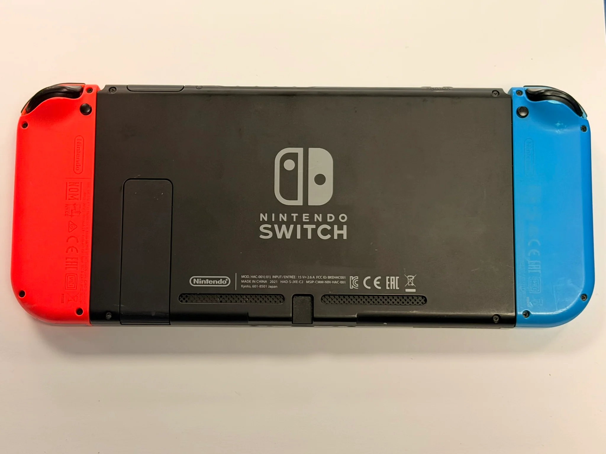 nintendo switch console red and blue joycons no dock - Image 4