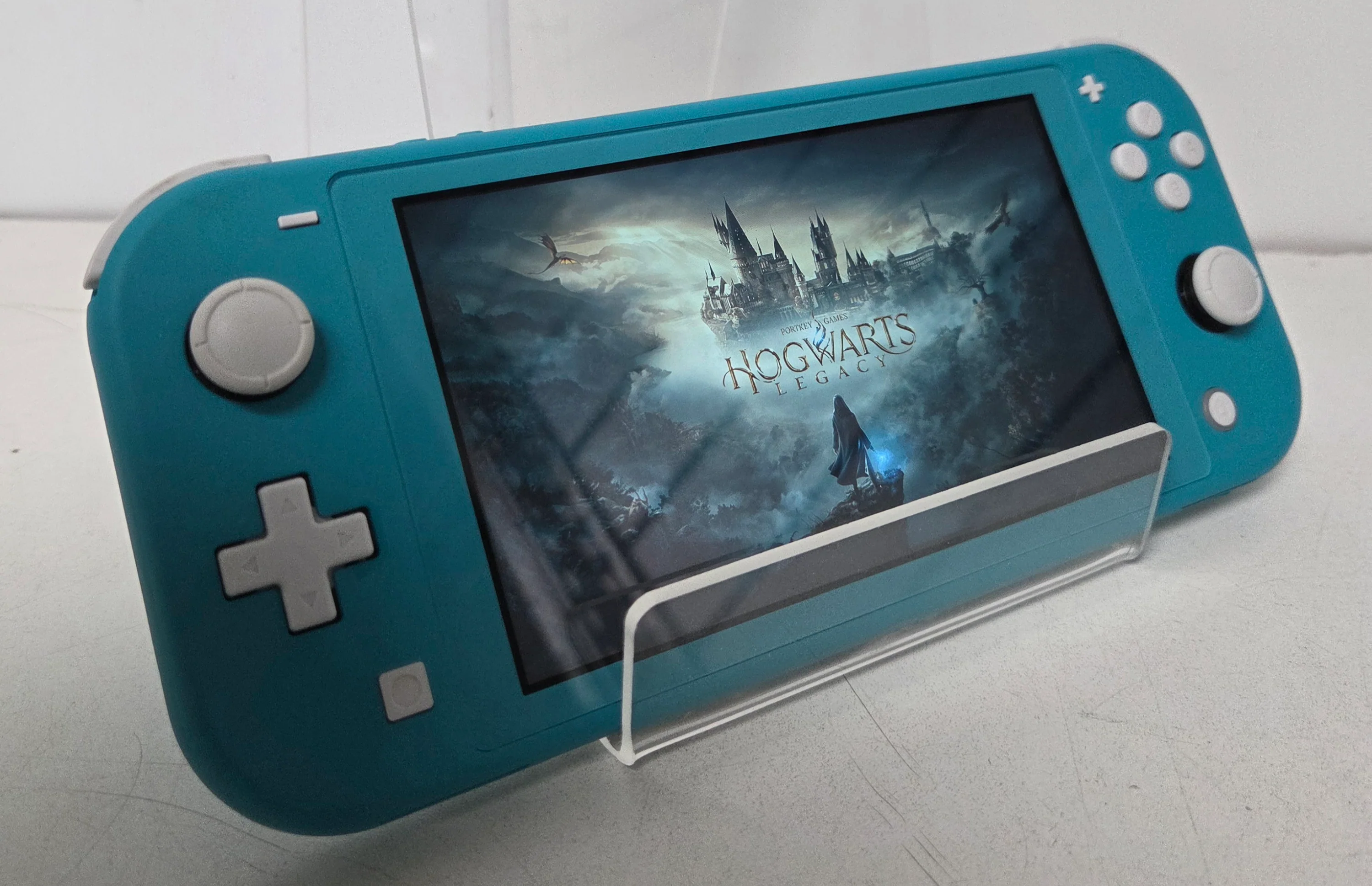 Nintendo Switch Lite - Turquoise & Hogwarts Legacy Unboxed Game - Image 2