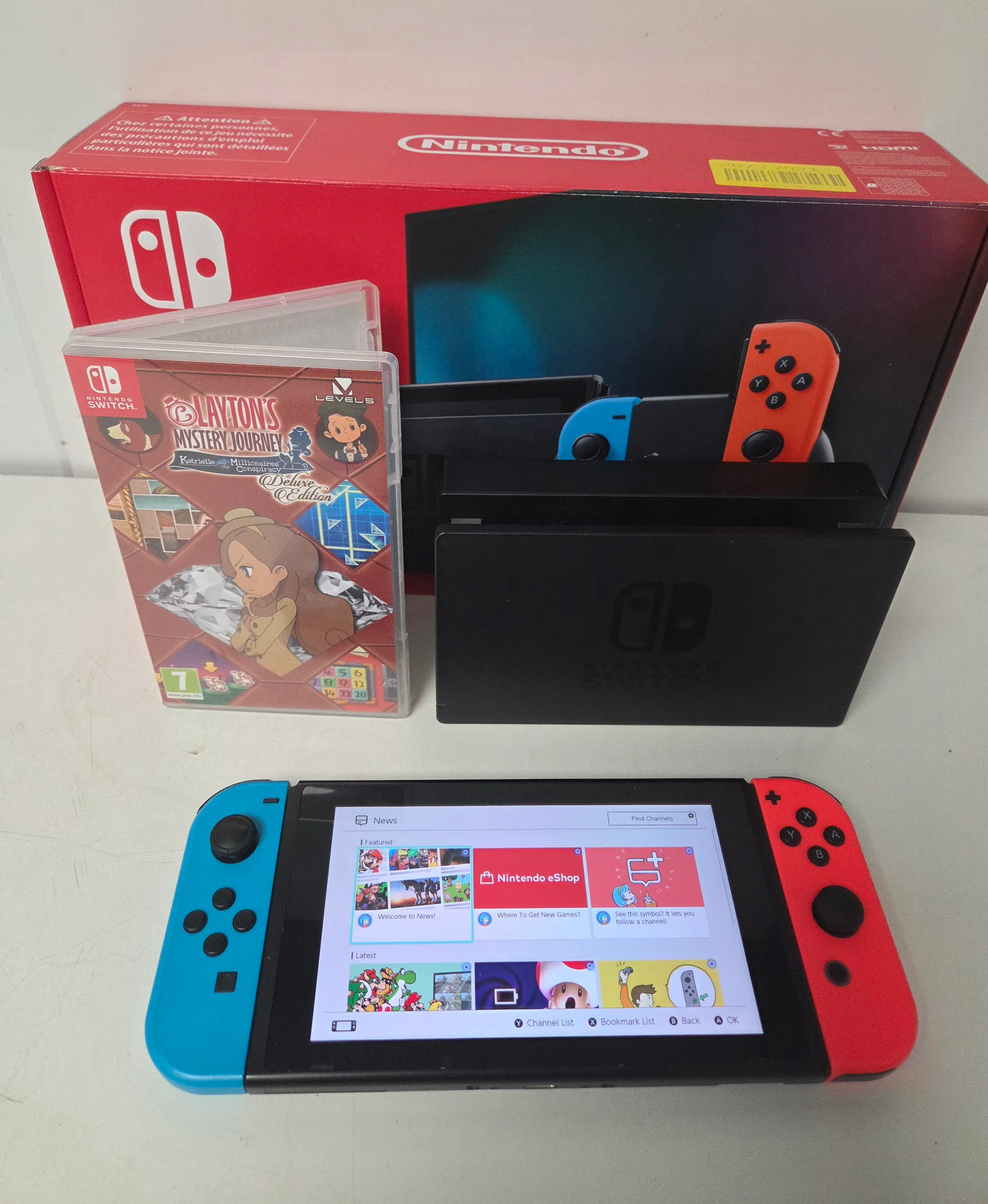 Nintendo Switch Neon Red/Blue & 1 Game - Image 2