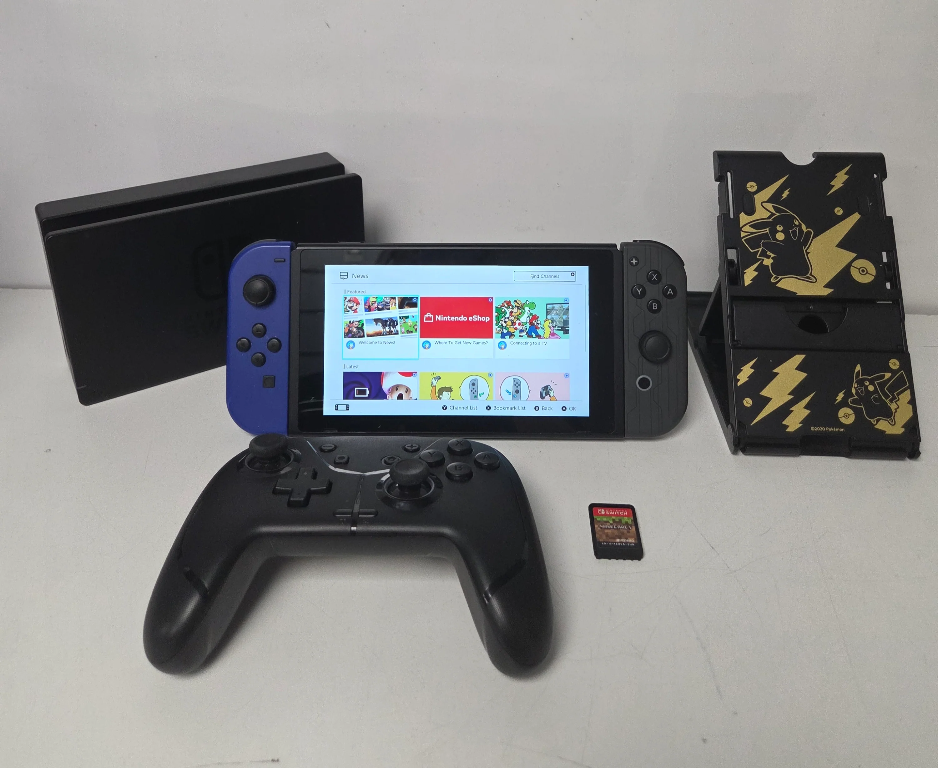 Nintendo Switch Blue & Black Controllers with Minecraft unboxed game, 128gb Memory Card & Game Controller - Image 2