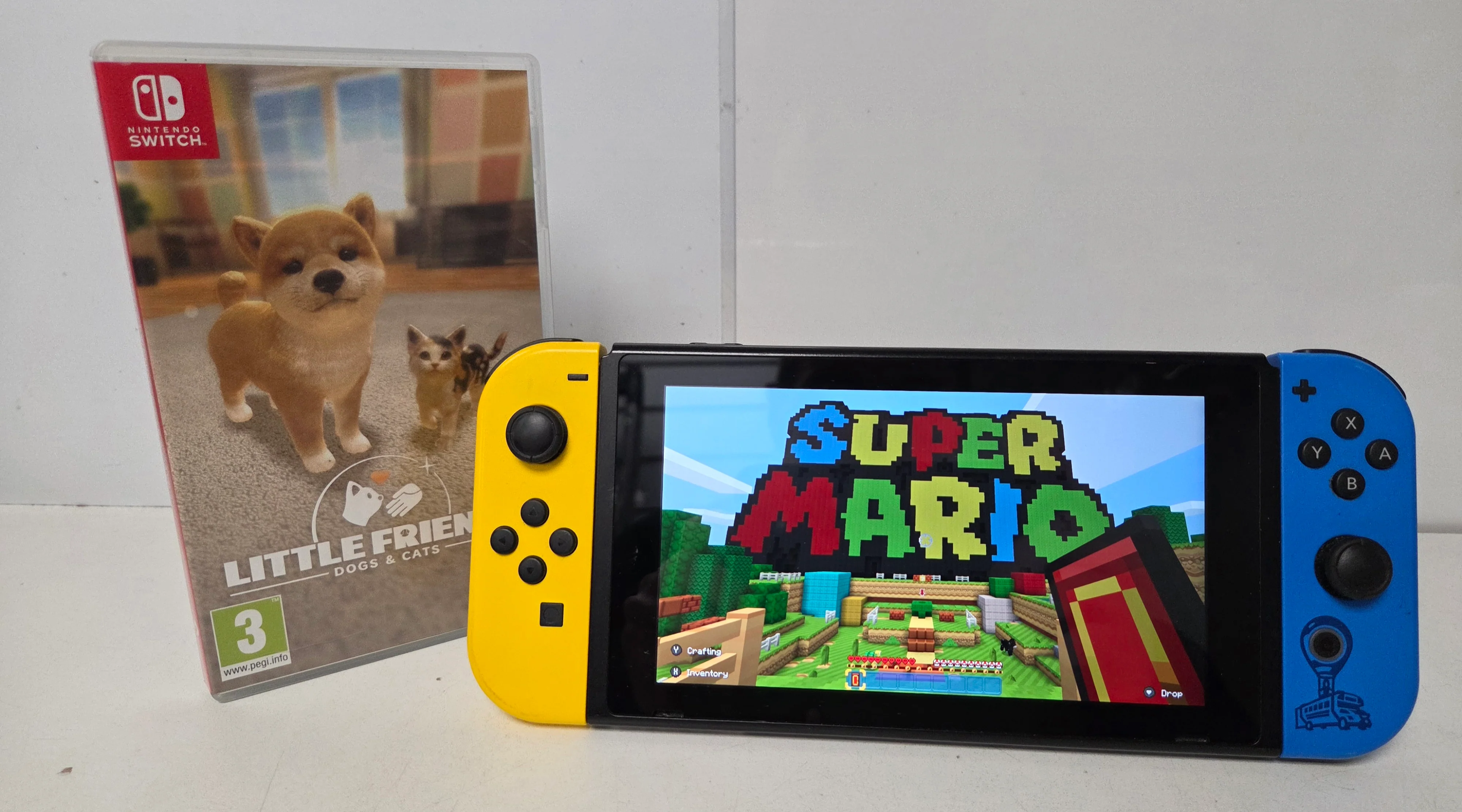 Nintendo Switch Yellow/Blue Console & 2 Games (1Unboxed) - Image 2